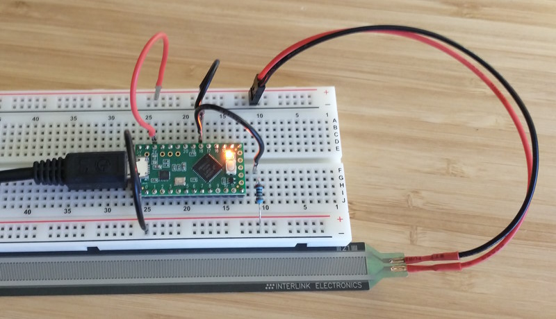 An FSR circuit prototyped on a solderless breadboard
